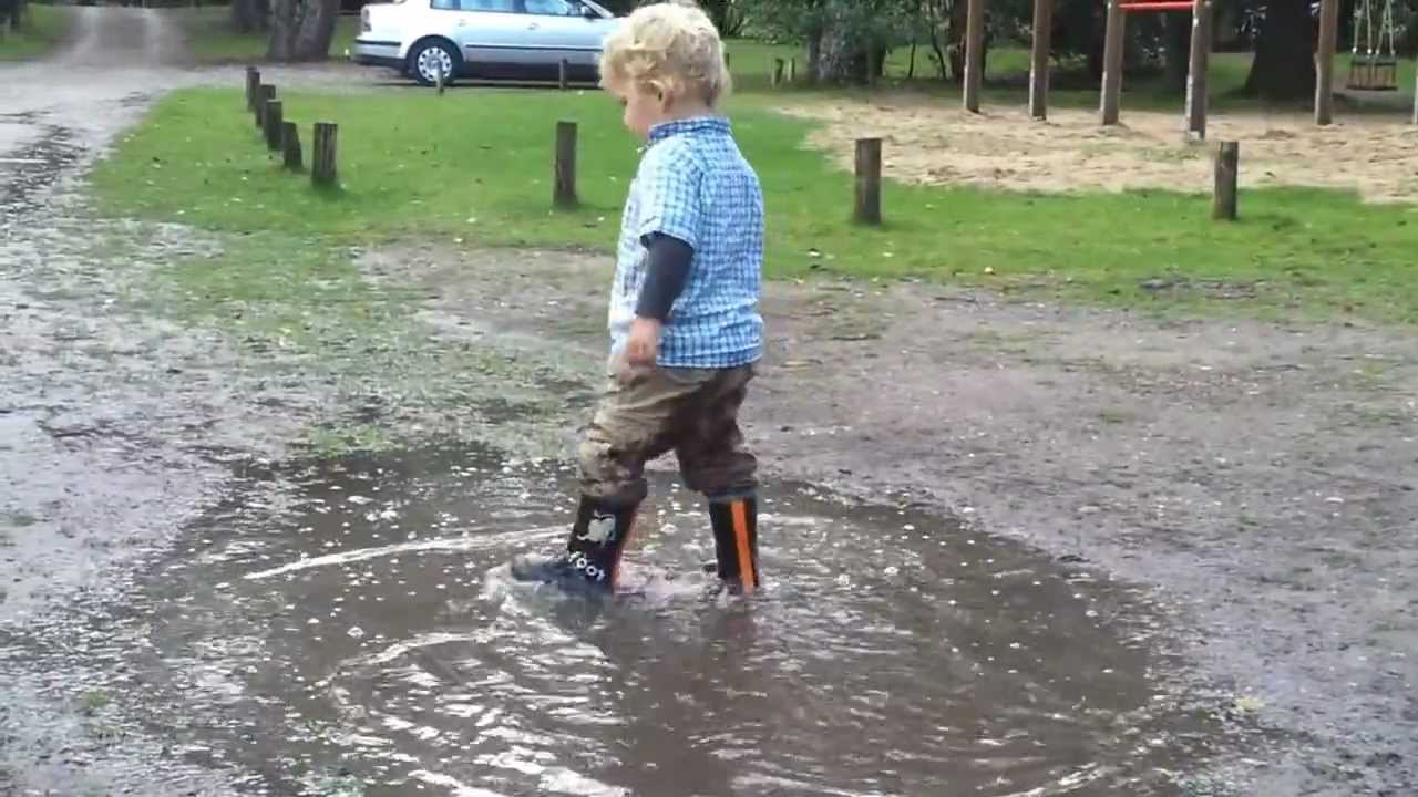 Valentijn playing in a puddle, falling in a puddle and crying - YouTube