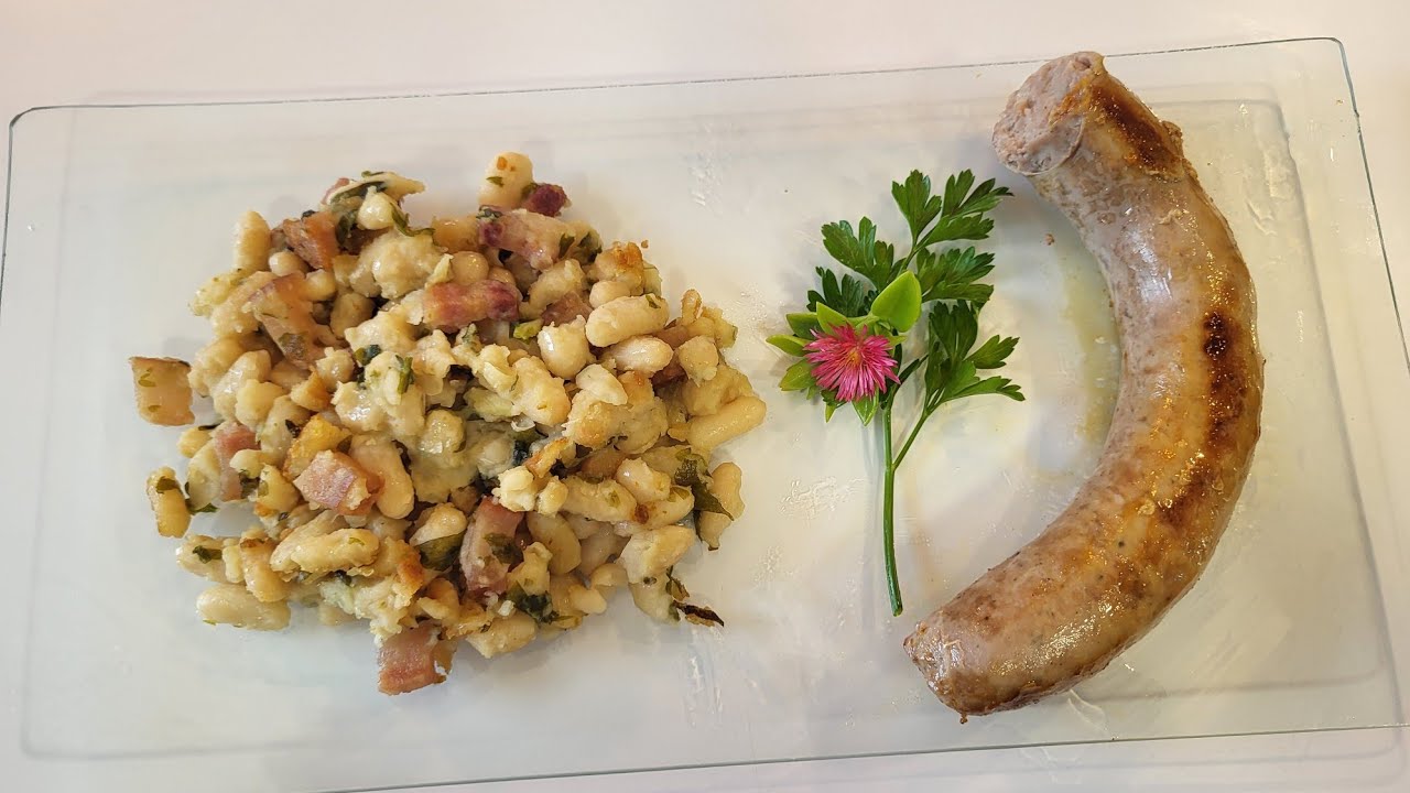 monchetas o judías blancas con butifarra.