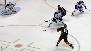 Perry snipes puck past the blocker of Hutchinson