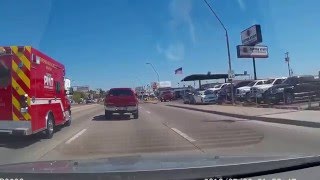 Truck runs a red light.