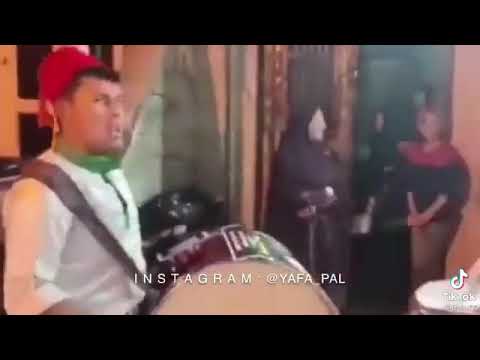 المسحراتي عندما يصل الى بيت الشهيد في فلسطين 