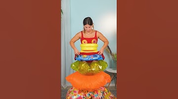 She Made a Stunning Dress from Pool Inflatables and Floated in Style! 👗💦
