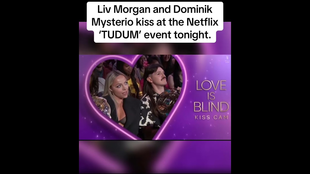 Liv Morgan and Dominik Mysterio Kiss at the Netflix TUDUM Event 