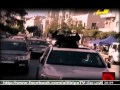 حمزة التهامي للقائد معمر ها أنت ذا فوق صخر الموت تزدهر نشر سعيد خليل مغربي 