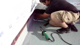 How to install deck roof - IB DeckShield inside corner flashing installation on a flat roof deck.