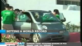 Pakistani Karachi Girls Sets New Guinness World Record - 19 Girls 1 Car.mp4