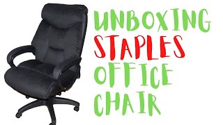 Unboxing Staples office chair. (not the one on the photo)