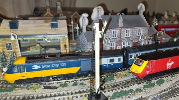 Hornby HST 125 Virgin set & Class 47 Intercity with Intercity Coaches BR HST at the back run around.