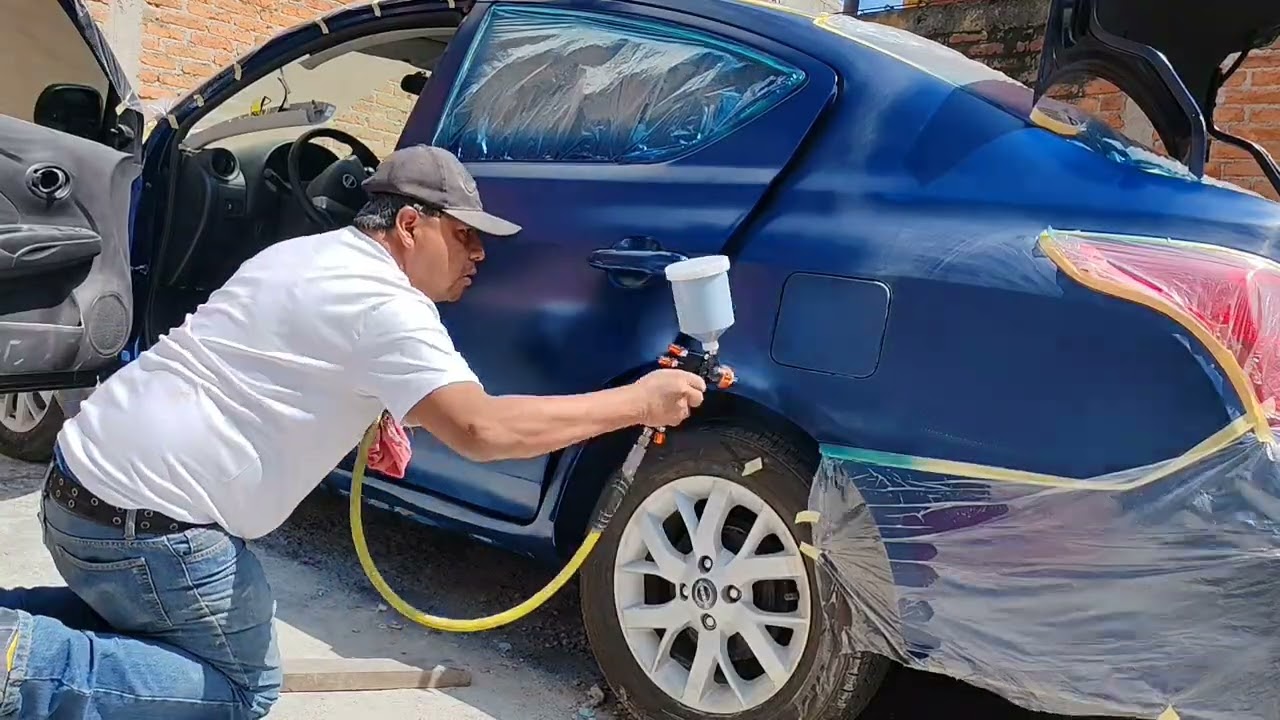 NISSAN V DRIVE REPARANDO GOLPE PUERTAS Y ESTRIBO 