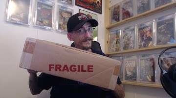 Unboxing my latest submissions that have returned from CGC!! Any 9.8
