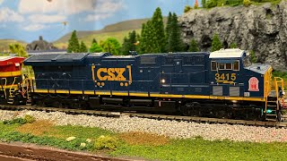 CSX #3415 with Kansas City Southern ( KCS ) #4765 Passes by with SPECIAL Caboose! ( HO-scale )