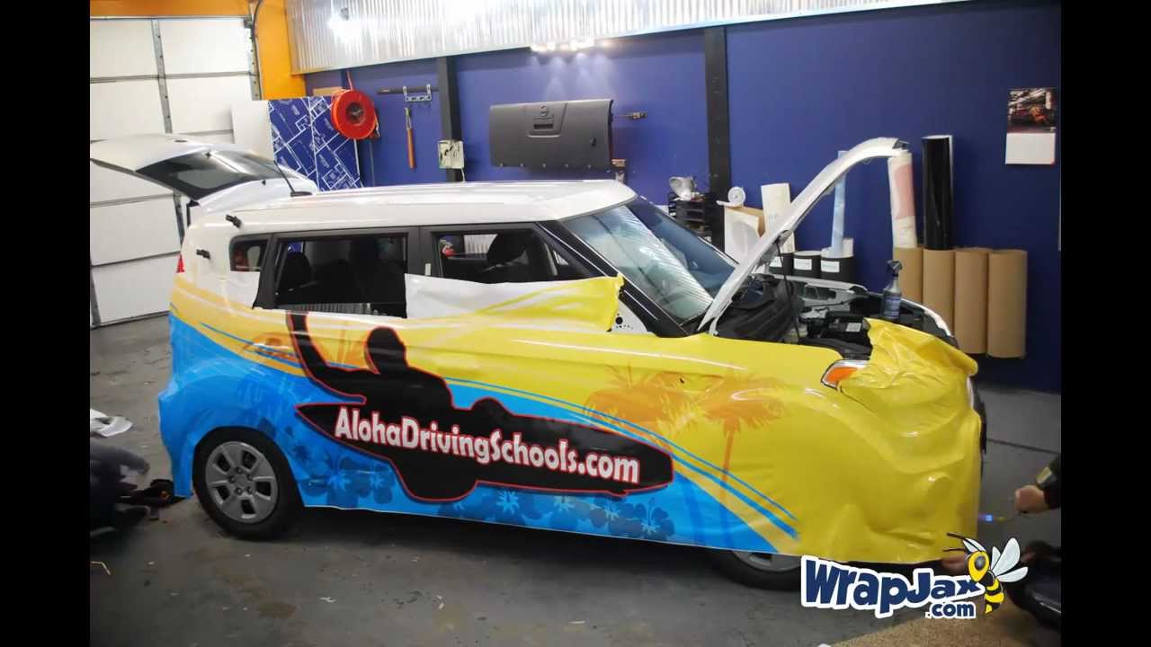 WrapJax.com - Time Lapse of Aloha Driving School 3/4 vehicle wrap installation on KIA Soul