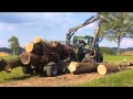 Eiche Rücken und Abtransportieren mit John Deere 6320 mit 9t Farma Rückewagen