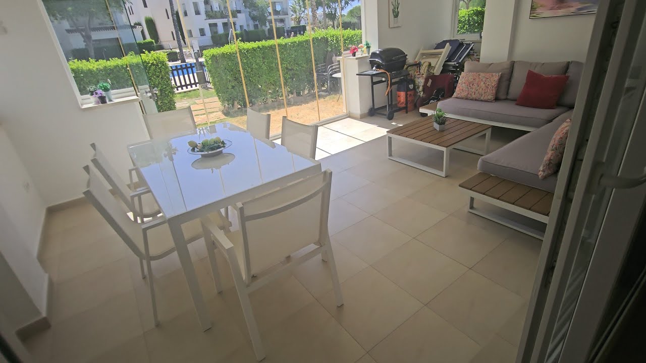 La Torre Golf Resort curved wall sunny Grnd Floor with huge terrace and glass curts on pool.149995€