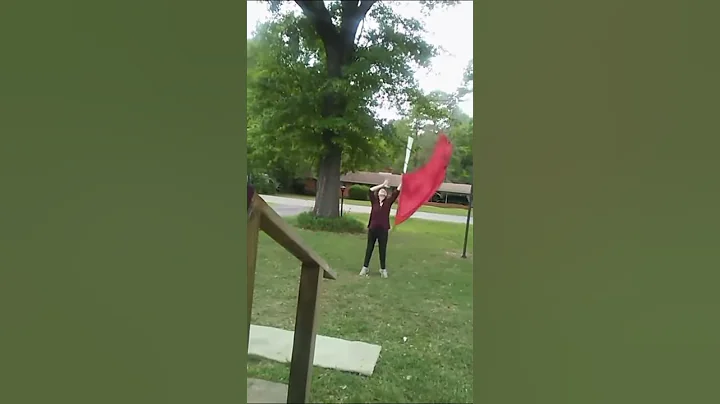 Julie is trying out for flag
