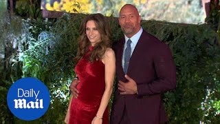 Dwayne Johnson cosies up to pregnant girlfriend at Jumanji premiere - Daily Mail Wealth