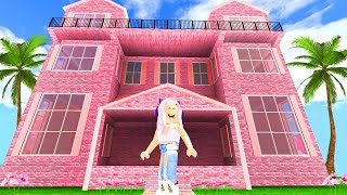 BUYING A HUGE PINK MANSION IN ROBLOX! 100,000 COIN SPENDING SPREE!