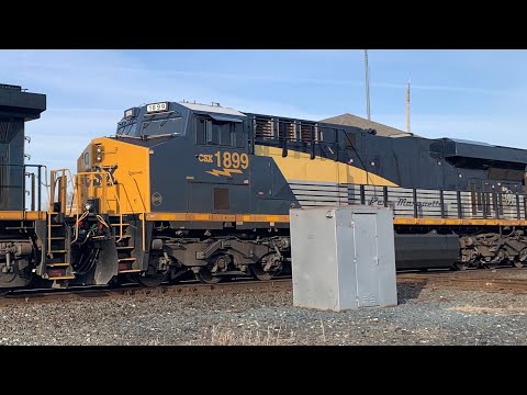 CSX I157-18 with Pere Marquette Heritage Unit Trailing