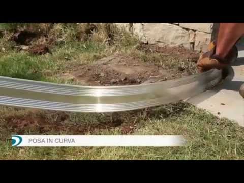 Come realizzare unaiuola curvilinea con ciottoli e bordura in ... Creare un aiuola