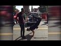 Police Officer Challenges Street Performer to Epic Dance Battle