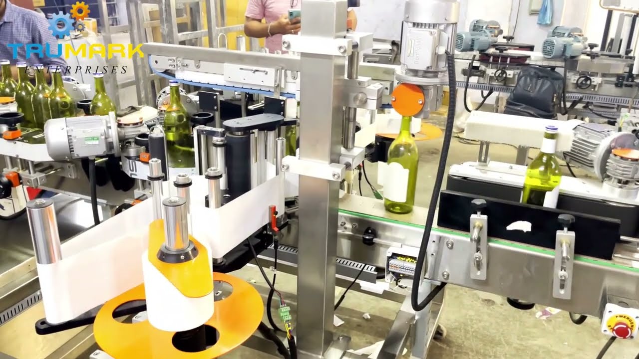 THE BEST LABEL APPLICATOR FOR LIQUOR BOTTLE FOR FRONT BACK AND NECK LABELING