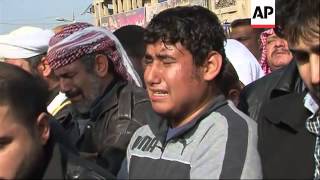 Hundreds of people take part in funeral of protesters killed during a shooting by army
