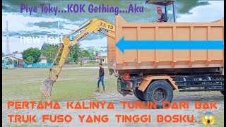 How to Unload an Excavator from a High Fuso Truck Bed