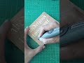 Gothic font calligraphy on wood