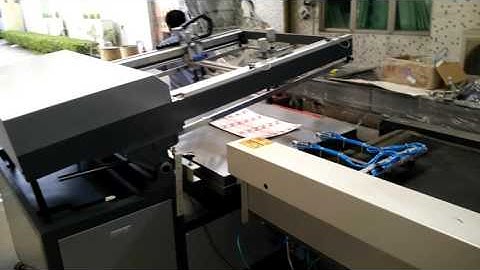 screen printer +UV dryer + automatic arm to unloading.