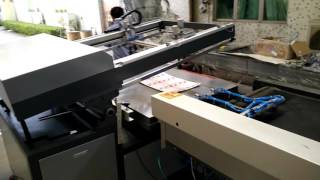 screen printer +UV dryer + automatic arm to unloading.