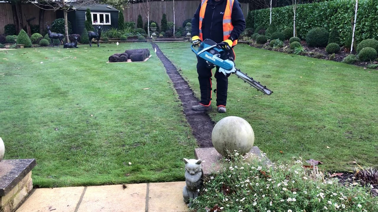 Irrigation trench with hand trencher YouTube