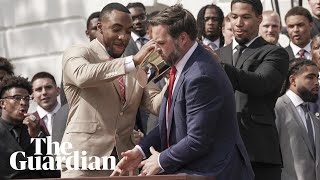 JD Vance fumbles football team's championship trophy at White House