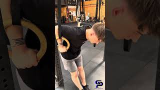 Ring dips (bottom pause)