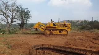 Caterpillar D8k taking trial of Ripper