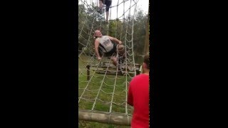 The fat man was stuck in the grid as the cobweb
