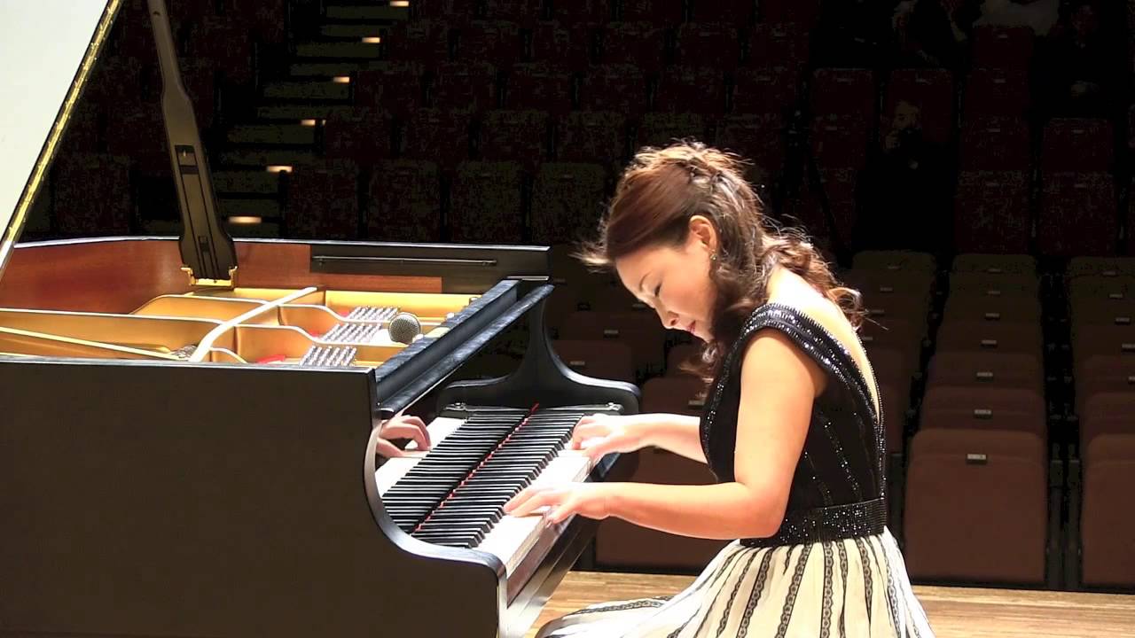 Naomi Suzuki plays piano at 2013 Christmas Concert