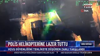 Polis helikopterine lazer tuttu Resimi