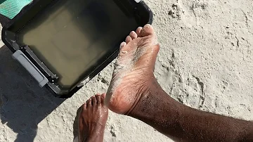 Life hack. How to remove sand from feet at beach.