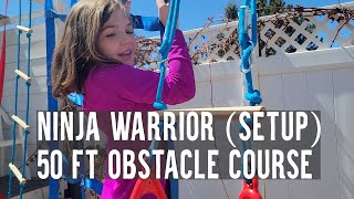 Setup for Dripex 50ft Ninja Warrior obstacle course