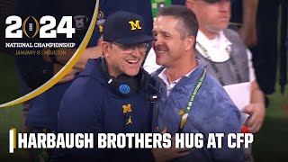 Surprise! Jim Harbaugh embraces brother John Harbaugh on sideline at CFP | ESPN College Football
