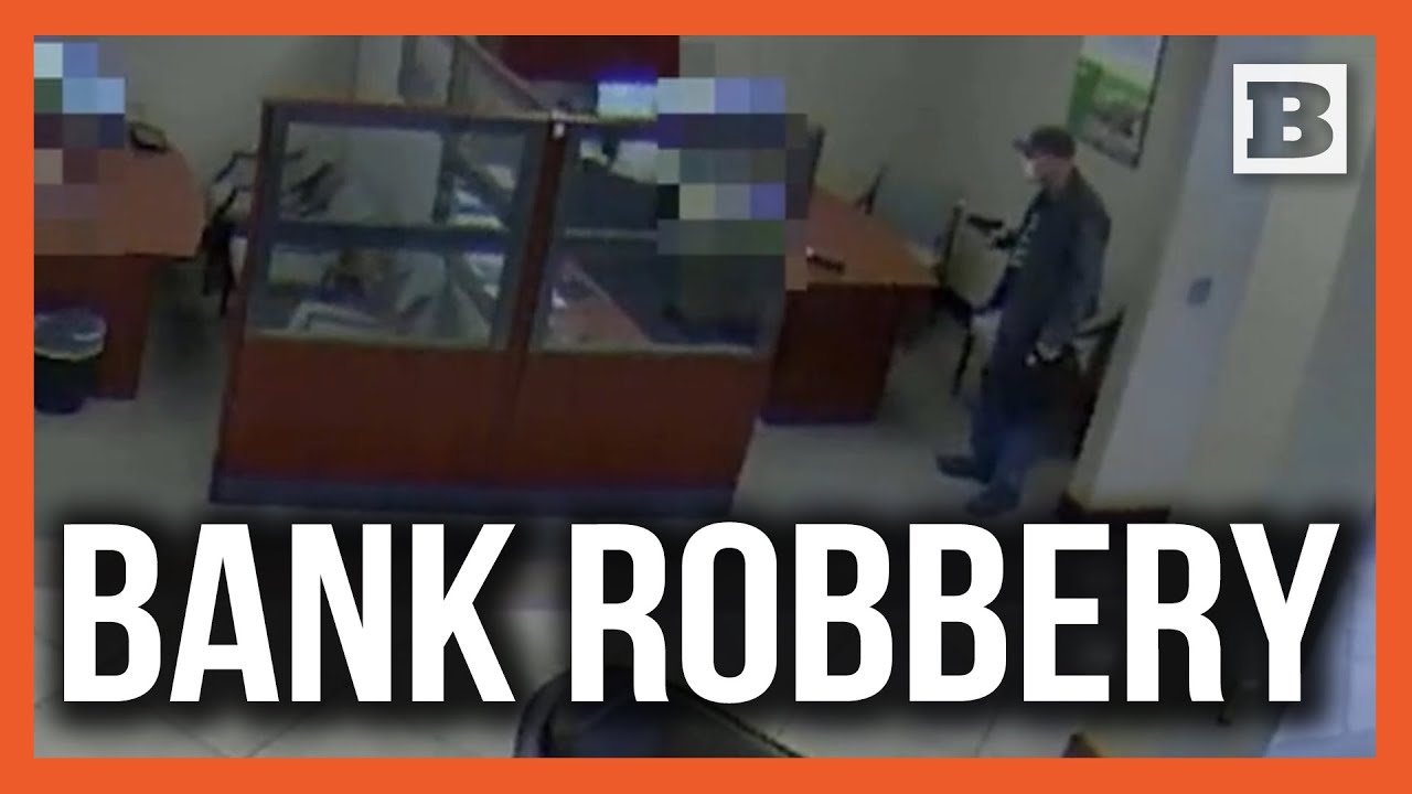 Police Searching for Robber Who Allegedly Pointed Firearm at Bank Employee
