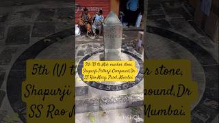 5th (V) th Mile marker stone, Shapurji Pallonji Compound,Dr SS Rao Marg, Parel, Mumbai.