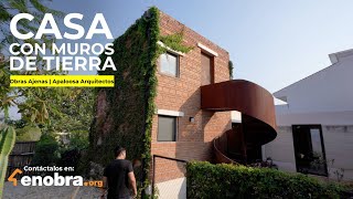 Tour a UNA CASA AUTOSUSTANBLE de MUROS de TIERRA COMPACTADA: un HOGAR con HUERTO | @apaloosaarq