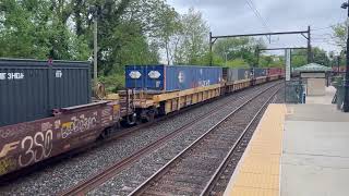 CSX I032 with Tropicana reefer cars, and a 5-unit 53' articulated well car at Olney station.