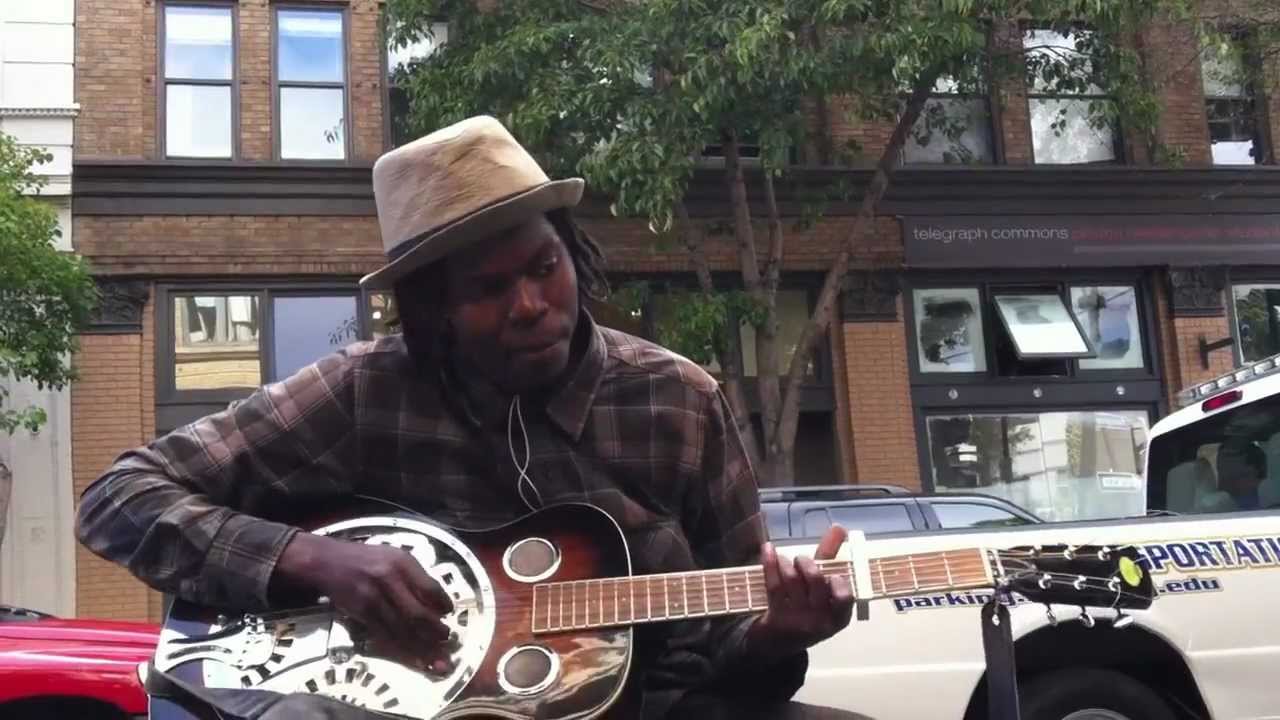 Sounds of Telegraph: Christopher Christy shreds on steel blues guitar outside of Rasputin Berkeley