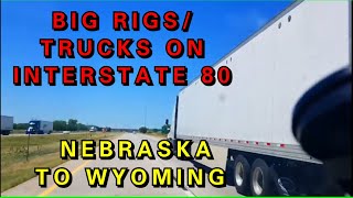 NEBRASKA TO WYOMING ON INTERSTATE 80 WEST/ HEARTLAND/ CORNFIELDS/ BIG RIGS TURCKS