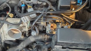 2008 Mazda 3 (2.3L) Coolant Housing/Water Outlet replacement.