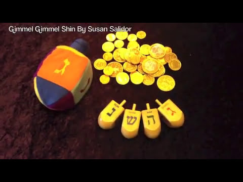 The Hanukkah Dreidel Game: A Fun Song for Kids " Gimmel, Gimme,l Shin" by Susan Salidor