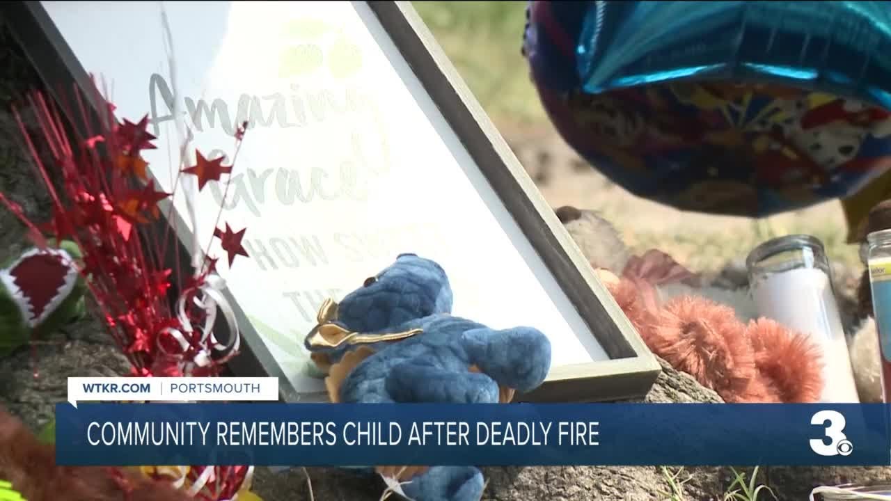 Community remembers child after deadly fire - YouTube