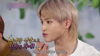 Taeyong enjoying the indian dessert while others don't
